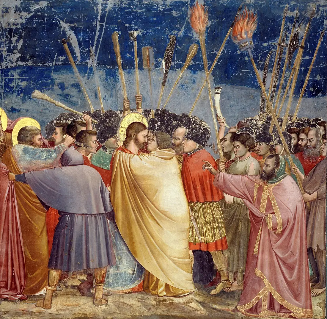 Giottos Fresko des Judaskusses, eine Menge erhebt Fackeln und Keulen um Christus und Judas von Angesicht zu Angesicht